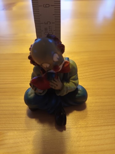 Gilde clown sitzend mit - sitzend,,
