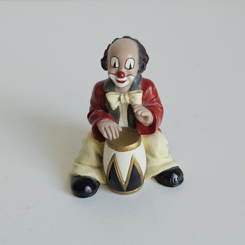 Gilde clown sitzender mit - sitzender,