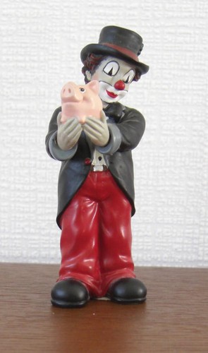 Gilde clown mit sparschwein - mit,